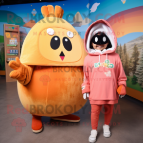 Peach Enchiladas mascot costume character dressed with a Hoodie and Backpacks