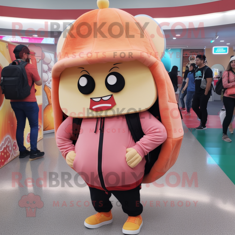 Peach Enchiladas mascot costume character dressed with a Hoodie and Backpacks Peach Enchiladas mascot costume character dressed with a Hoodie and Backpacks