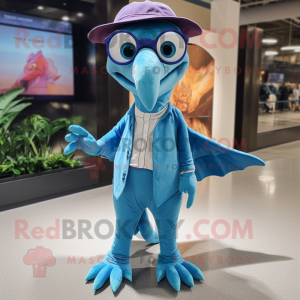 Blue Pterodactyl mascot costume character dressed with a Corduroy Pants and Eyeglasses