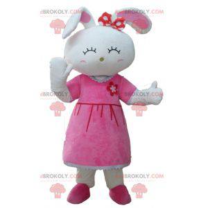 Maskot roztomilý bílý králík oblečený v růžových šatech -