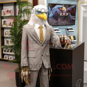 Gray Bald Eagle mascot costume character dressed with a Blazer and Earrings