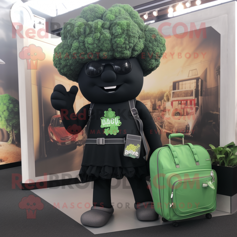 Black Broccoli mascot costume character dressed with a Henley Tee and Briefcases Black Broccoli mascot costume character dressed with a Henley Tee and Briefcases