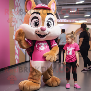 Pink Chipmunk mascot costume character dressed with a Graphic Tee and Watches