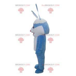 Giant blue and white rabbit mascot with big ears -