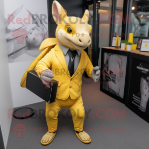 Yellow Armadillo mascot costume character dressed with a Suit Jacket and Briefcases