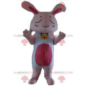 Giant pink and white rabbit mascot with closed eyes -