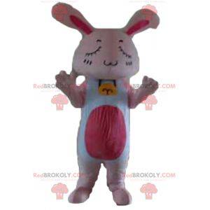 Mascotte de lapin rose et blanc géant avec les yeux fermés -