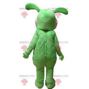 Měkký a roztomilý zelený a béžový maskot králíka -
