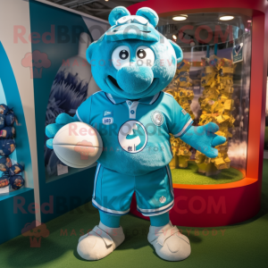 Turquoise Rugby Ball mascot costume character dressed with a Rugby Shirt and Brooches