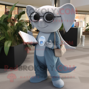 Gray Stingray mascot costume character dressed with a Flare Jeans and Reading glasses