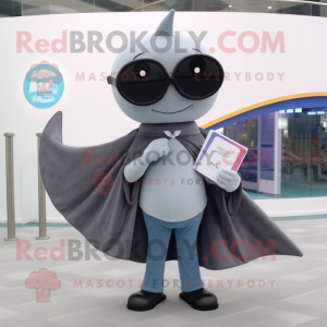 Gray Stingray mascot costume character dressed with a Flare Jeans and Reading glasses