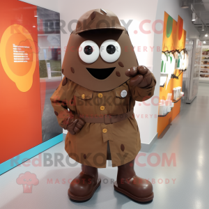 Brown Grenade mascot costume character dressed with a Raincoat and Shoe clips