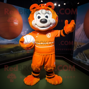 Orange Momentum mascot costume character dressed with a Rugby Shirt and Wraps