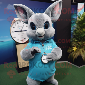 Cyan Chinchilla mascot costume character dressed with a Polo Tee and Bracelet watches