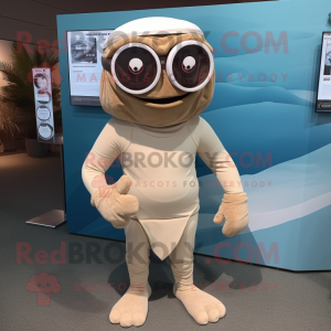 Beige Cyclops mascot costume character dressed with a Rash Guard and Ties