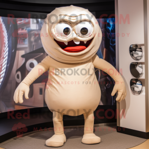 Beige Cyclops mascot costume character dressed with a Rash Guard and Ties