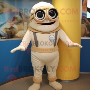 Beige Cyclops mascot costume character dressed with a Rash Guard and Ties