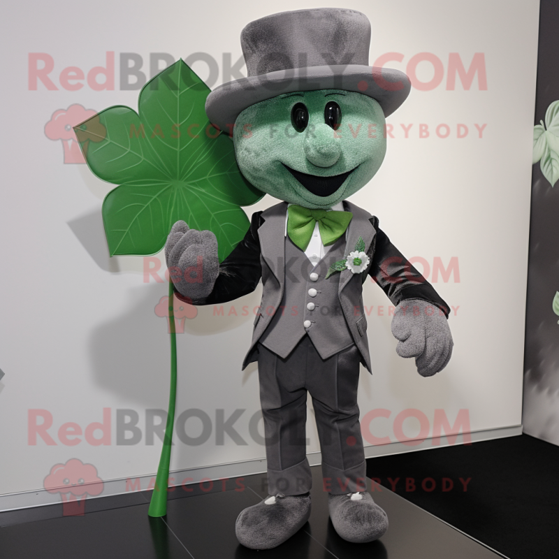 Gray Four Leaf Clover mascot costume character dressed with a Suit Pants and Brooches Gray Four Leaf Clover mascot costume character dressed with a Suit Pants and Brooches