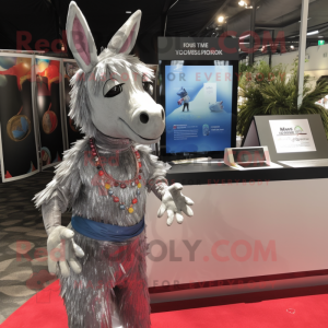 Silver Donkey mascot costume character dressed with a Wrap Dress and Earrings