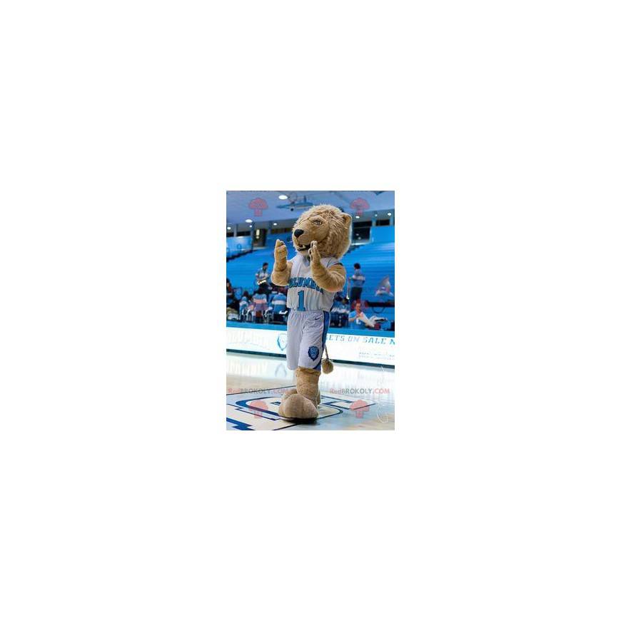 Mascotte de lion beige en tenue de sport bleue et blanche - Mascotte de lion beige en tenue de sport bleue et blanche -