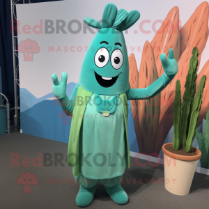 Teal Asparagus mascot costume character dressed with a Wrap Dress and Suspenders