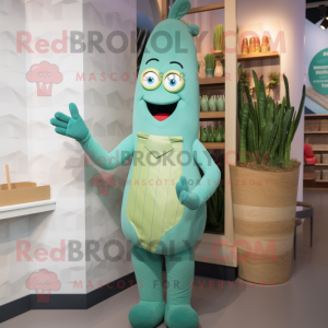 Teal Asparagus mascot costume character dressed with a Wrap Dress and Suspenders