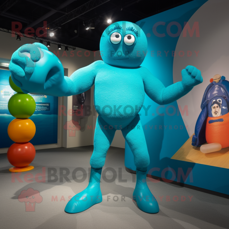 Turquoise Human Cannon Ball mascot costume character dressed with a One-Piece Swimsuit and Mittens Turquoise Human Cannon Ball mascot costume character dressed with a One-Piece Swimsuit and Mittens