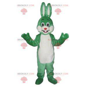 Mascotte de lapin vert et blanc souriant et original -