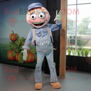 Peach Zombie mascot costume character dressed with a Chambray Shirt and Keychains