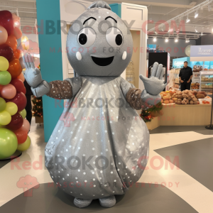 Silver Meatballs mascot costume character dressed with a Maxi Dress and Mittens