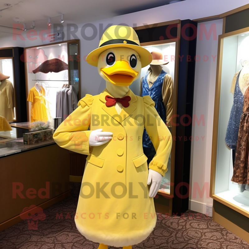 Yellow Muscovy Duck mascot costume character dressed with a Sheath Dress and Hat pins Yellow Muscovy Duck mascot costume character dressed with a Sheath Dress and Hat pins