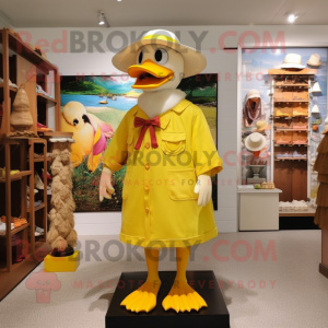 Yellow Muscovy Duck mascot costume character dressed with a Sheath Dress and Hat pins