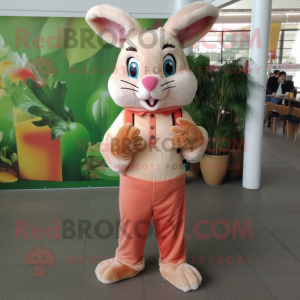 Peach Wild Rabbit mascot costume character dressed with a Graphic Tee and Brooches