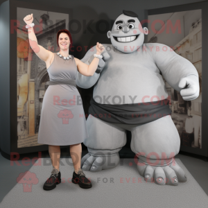 Gray Strongman mascot costume character dressed with a Midi Dress and Earrings