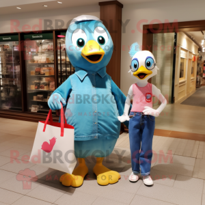 Cyan Gosling mascot costume character dressed with a Mom Jeans and Tote bags