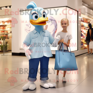 Cyan Gosling mascot costume character dressed with a Mom Jeans and Tote bags