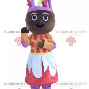 African woman mascot in colorful outfit - Redbrokoly.com