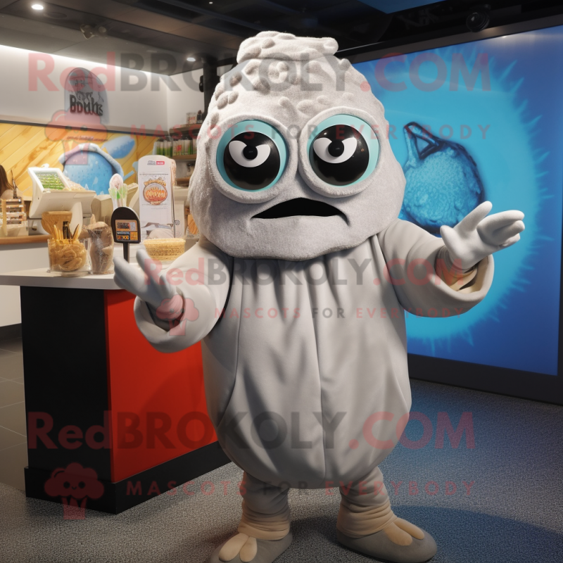 Silver Fried Calamari mascot costume character dressed with a Turtleneck and Beanies Silver Fried Calamari mascot costume character dressed with a Turtleneck and Beanies