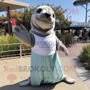 Silver Sea Lion mascot costume character dressed with a Midi Dress and Mittens