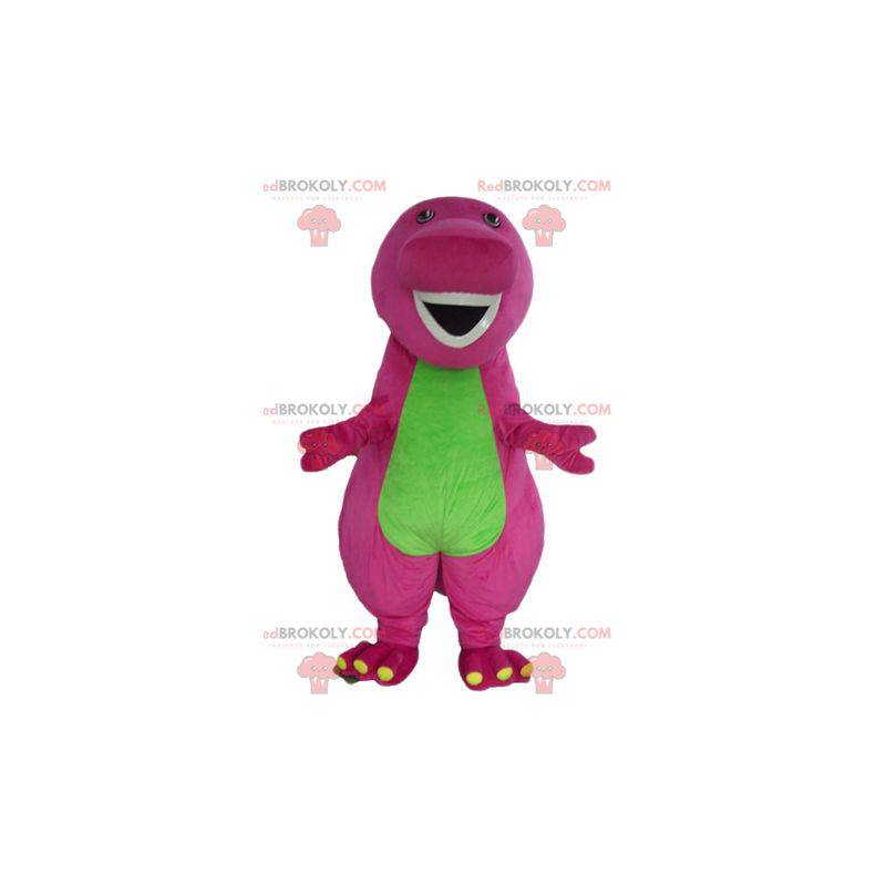 Mascote gigante gigante e engraçado de dinossauro rosa e verde