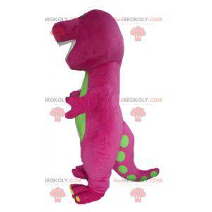 Mascotte dinosauro gigante rosa e verde paffuto e divertente -