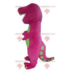 Mascota de dinosaurio rosa y verde gigante regordeta y