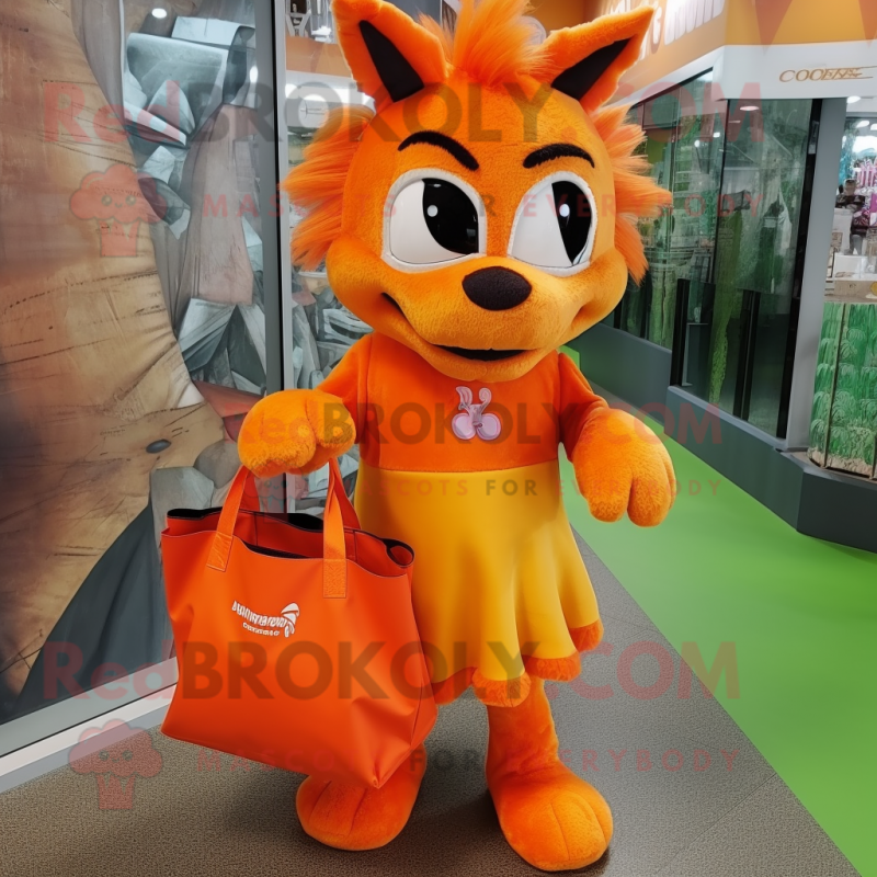 Orange Chupacabra mascot costume character dressed with a Skirt and Tote bags
