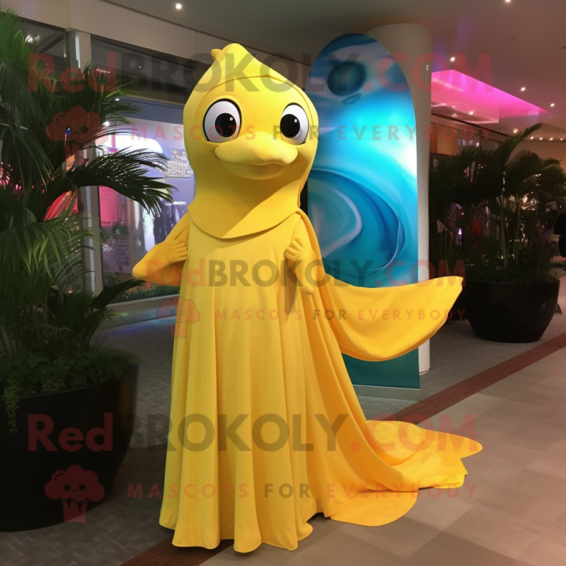 Yellow Dolphin mascot costume character dressed with a Evening Gown and Wraps