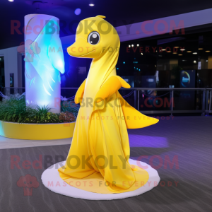 Yellow Dolphin mascot costume character dressed with a Evening Gown and Wraps