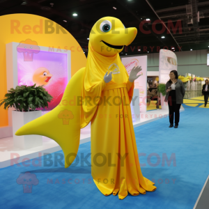 Yellow Dolphin mascot costume character dressed with a Evening Gown and Wraps