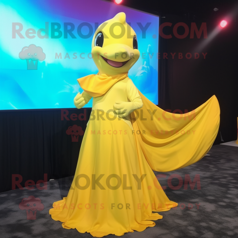 Yellow Dolphin mascot costume character dressed with a Evening Gown and Wraps