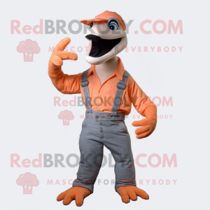 Peach Deinonychus mascot costume character dressed with a Overalls and Gloves