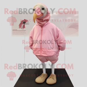 Pink Guinea Fowl mascot costume character dressed with a Long Sleeve Tee and Shoe laces