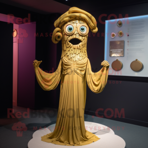 Gold Medusa mascot costume character dressed with a Shift Dress and Shawl pins